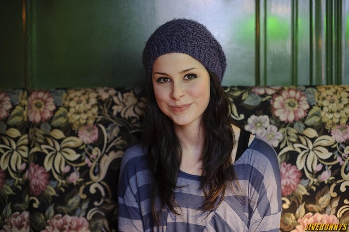 Lena Meyer Landrut wearing a knit hat and striped shirt