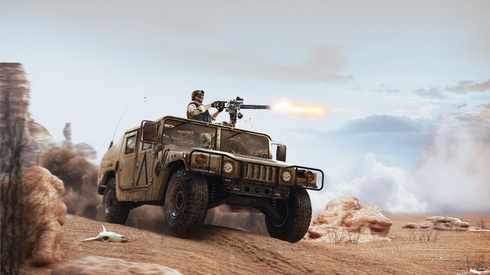 Soldier firing minigun from HMMWV in desert