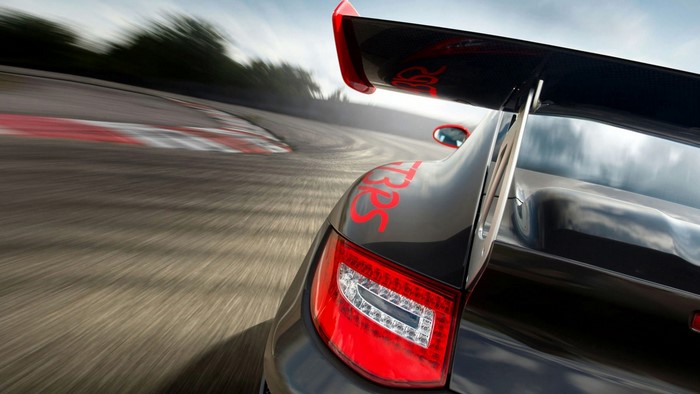 Porsche GT3 racing on a track