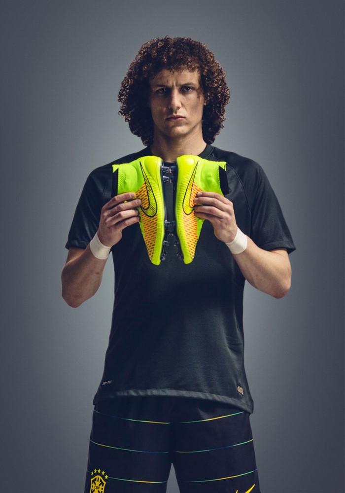 David Luiz holding Nike Mercurial soccer cleats
