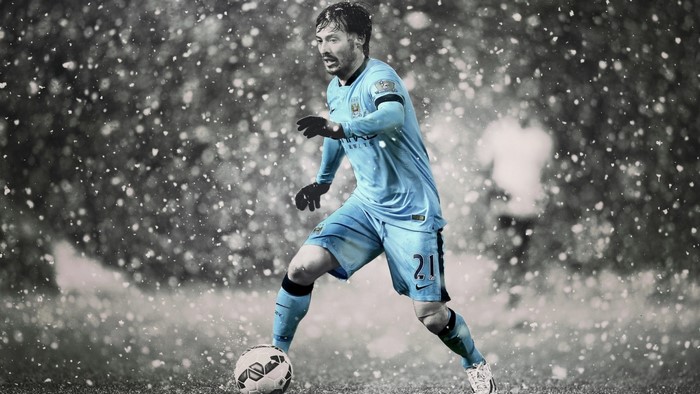 David Silva playing soccer in the snow for Manchester City