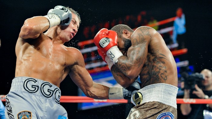 Gennady Golovkin lands a punch on opponent in boxing match