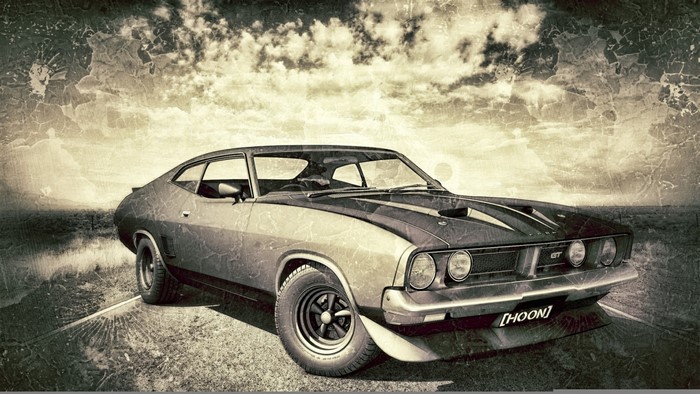 Vintage Ford Falcon GT Coupe on a Road