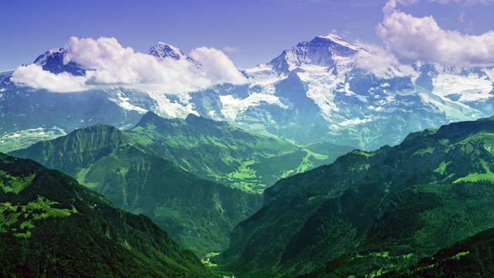 Majestic Alpine Mountain Range with Lush Valleys