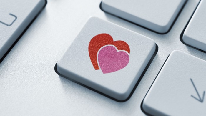 Computer keyboard key with two hearts