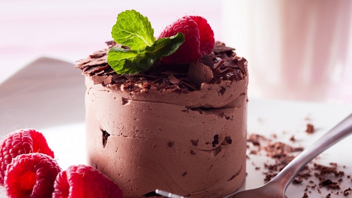 Chocolate mousse cake with raspberries and mint