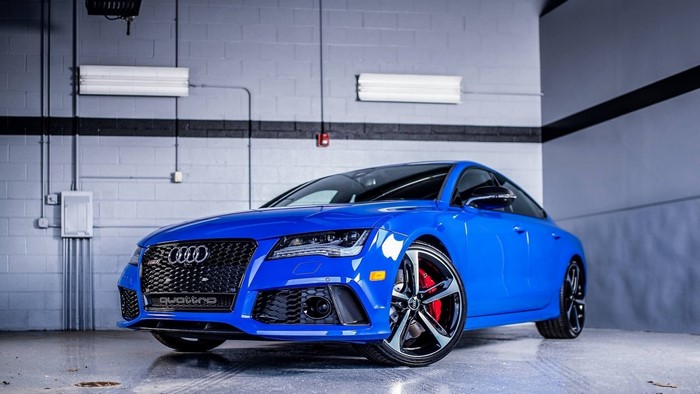 Blue Audi RS7 Quattro parked in a garage