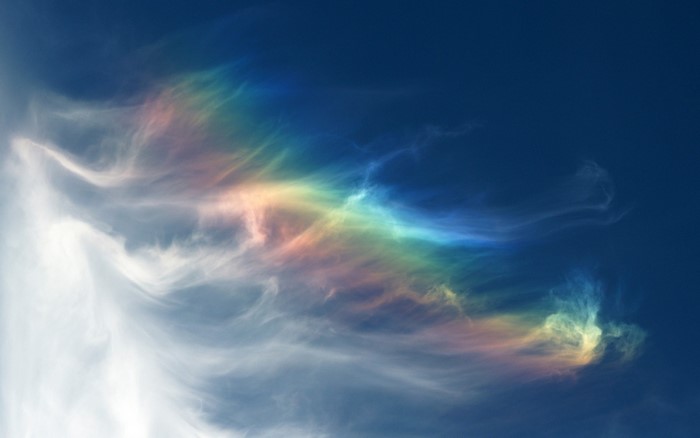 Iridescent clouds in a blue sky