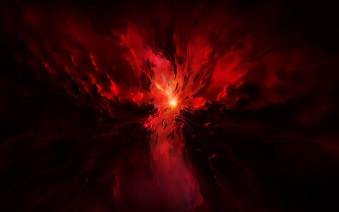 Red nebula with bright center in outer space