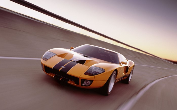 Orange Ford GT sports car on a track
