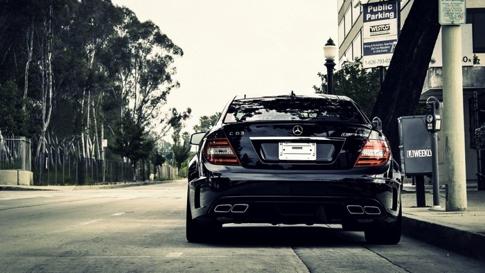 Black Mercedes-Benz C63 AMG parked on street