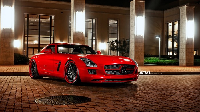 Red Mercedes-Benz SLS AMG parked at night