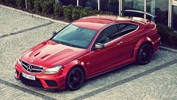 Red Mercedes-Benz C63 AMG Coupe with Spoiler