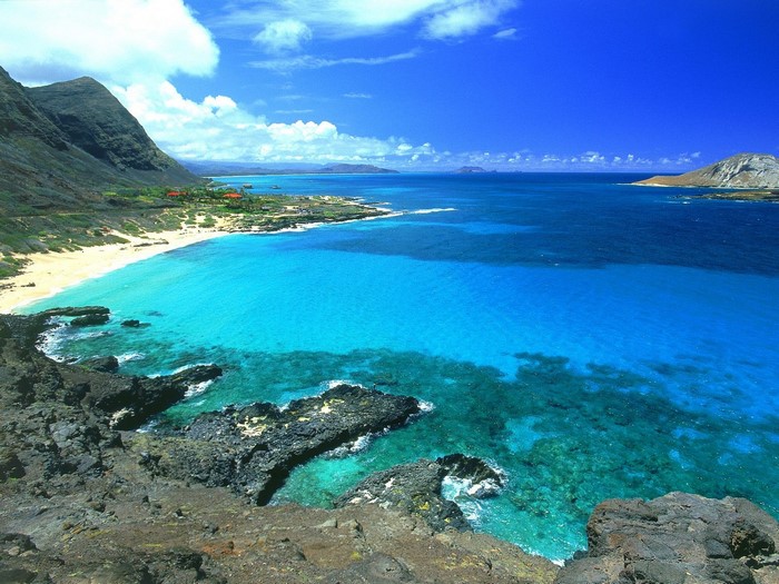 Turquoise bay with rocky coastline and mountains