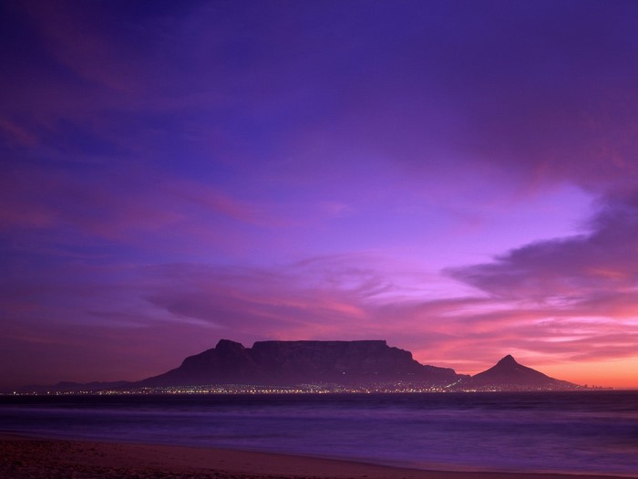 Table Mountain at sunset over the ocean