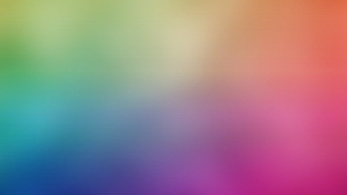 Abstract gradient of green, blue, pink, and orange colors