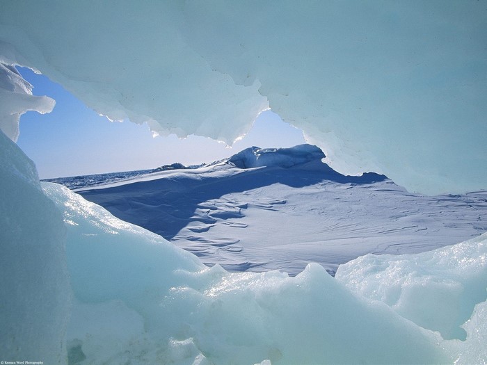 Iceberg landscape with snow and blue sky