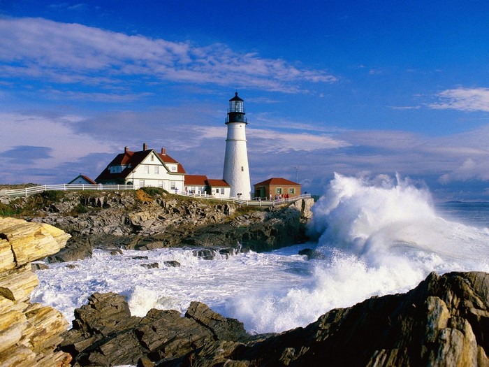 Portland Head Light Lighthouse on Rocky Coast with Crashing Waves
