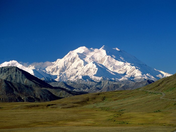Denali Mountain Range in Alaska under a Clear Blue Sky