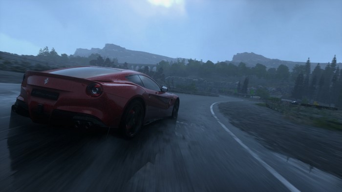 Ferrari F12berlinetta driving on a wet road