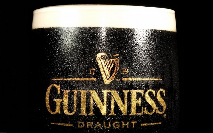 Close-up of a cold Guinness Draught beer glass
