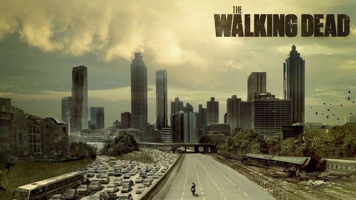 The Walking Dead title card with Atlanta skyline and highway