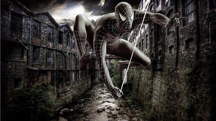 Spider-Man in black suit in abandoned industrial area
