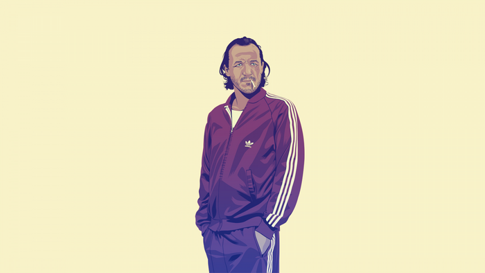 Man in Adidas tracksuit smoking