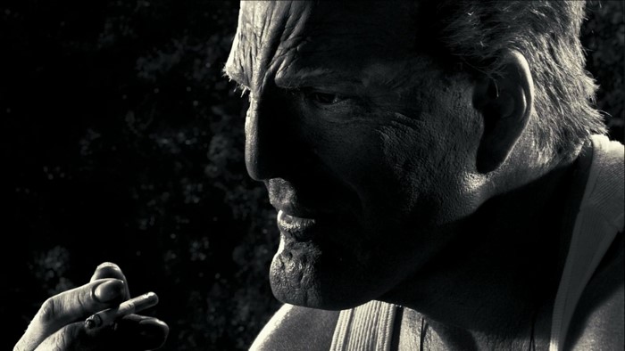 Marv from Sin City smoking a cigarette