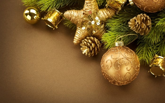 Golden Christmas Decorations and Pine Cones on Fir Branch
