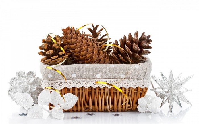 Christmas basket with pine cones and ornaments