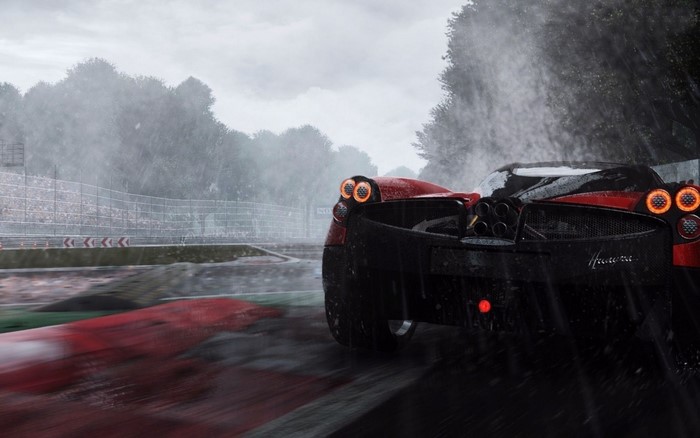 Pagani Huayra driving on a wet race track in the rain