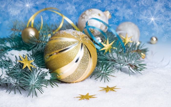 Golden Christmas Ornaments with Snowy Fir Branches