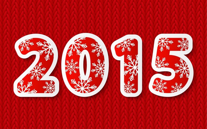 2015 numbers with snowflakes on red knitted background