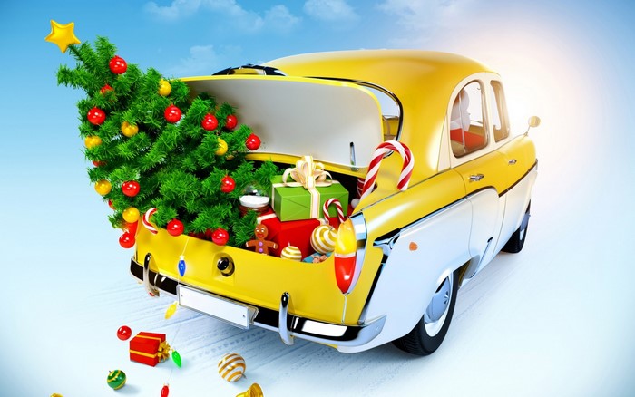 Yellow and white car loaded with Christmas tree and gifts