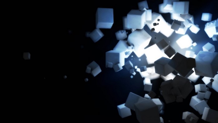 Abstract composition of glowing white cubes in darkness