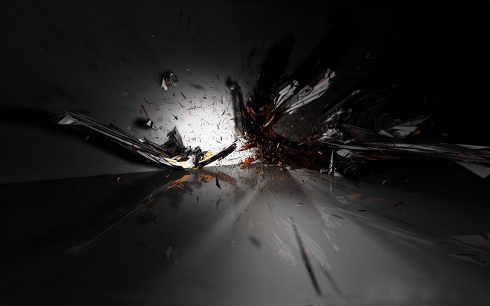 Abstract explosion of black and orange shards