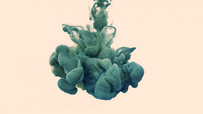 Abstract green ink cloud in water