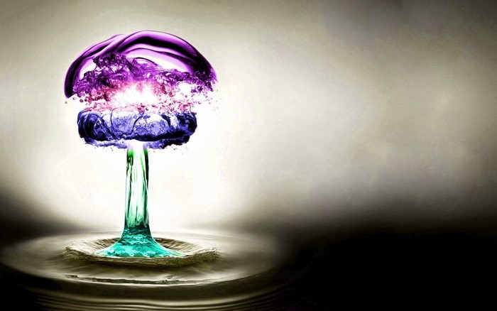 Abstract purple and blue water splash in a wine glass