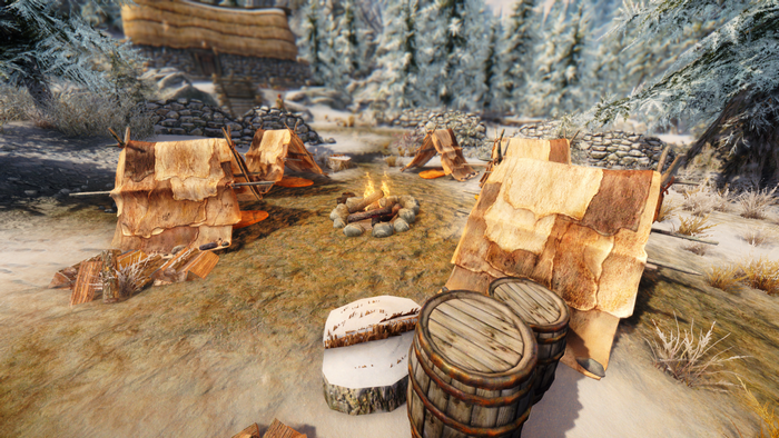 The Elder Scrolls V Skyrim campsite with tents and campfire