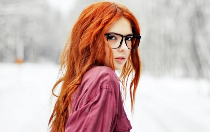 Redhead Woman with Glasses in Winter Setting
