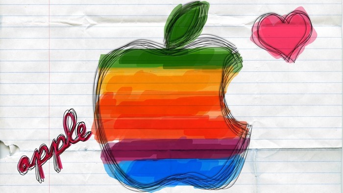 Apple logo with heart and text on notebook paper