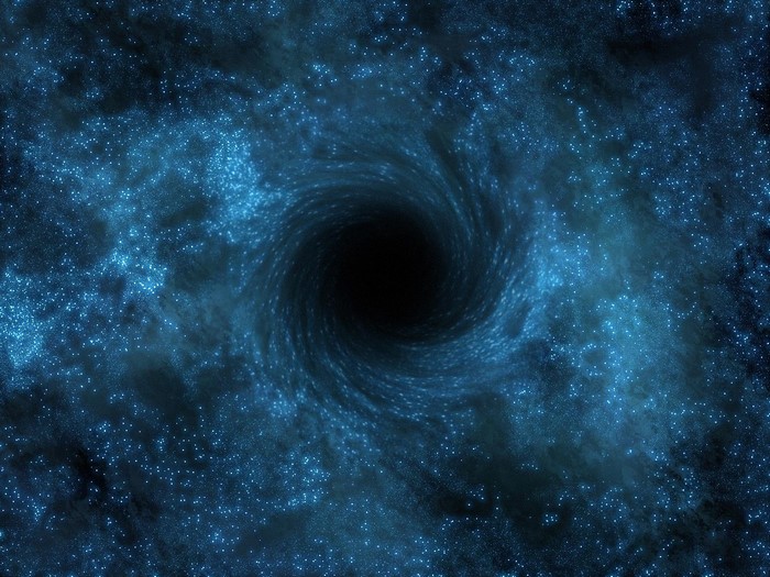 Black hole in a blue nebula with stars