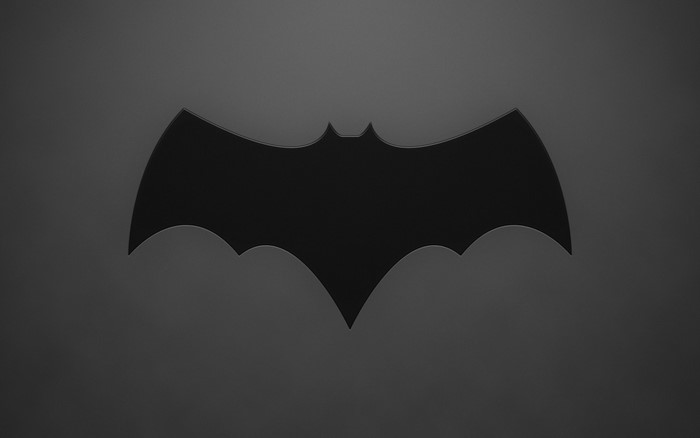 Batman logo on a dark background