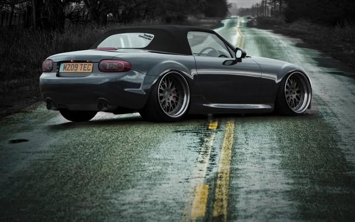 Mazda MX-5 Convertible on a Wet Road