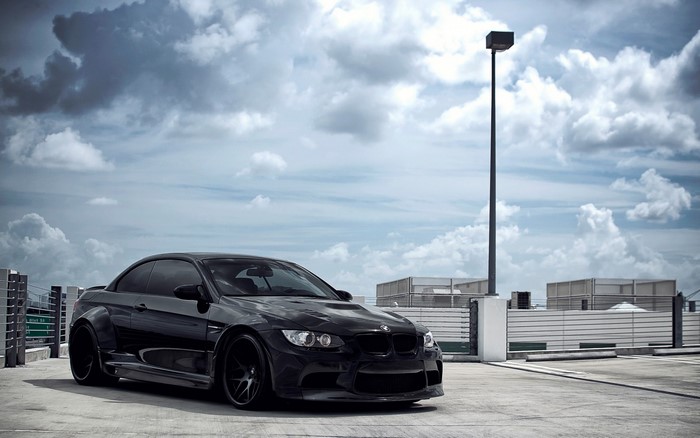 Black BMW M3 Coupe on a Rooftop Parking Lot
