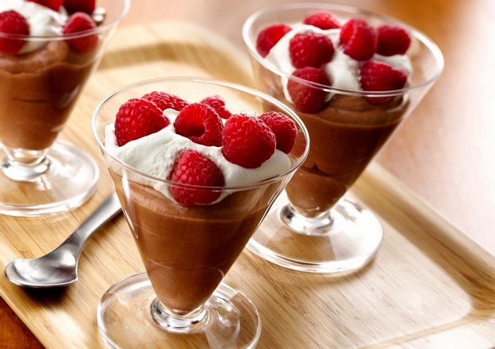 Chocolate mousse with raspberries and whipped cream
