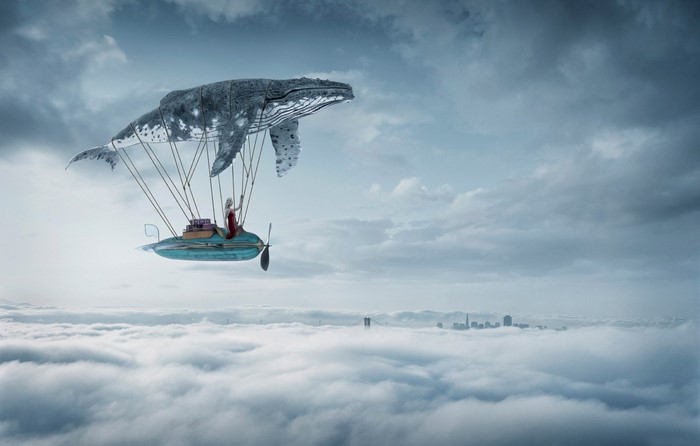 Whale airship carrying a woman over clouds and city