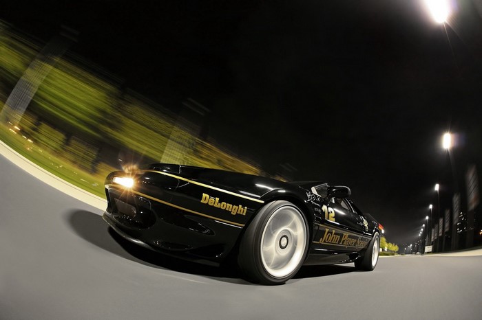 Black Lotus Esprit John Player Special DeLonghi race car at night