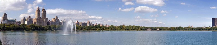 New York City skyline with Central Park reservoir and fountain